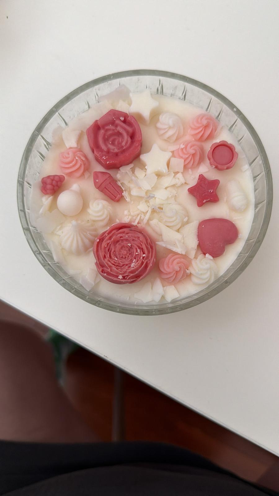 Candle with replica miniature flowers and dolls goodies (all wax)