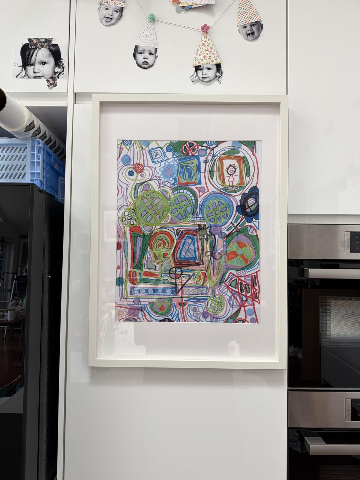 A framed print of one of my drawings 