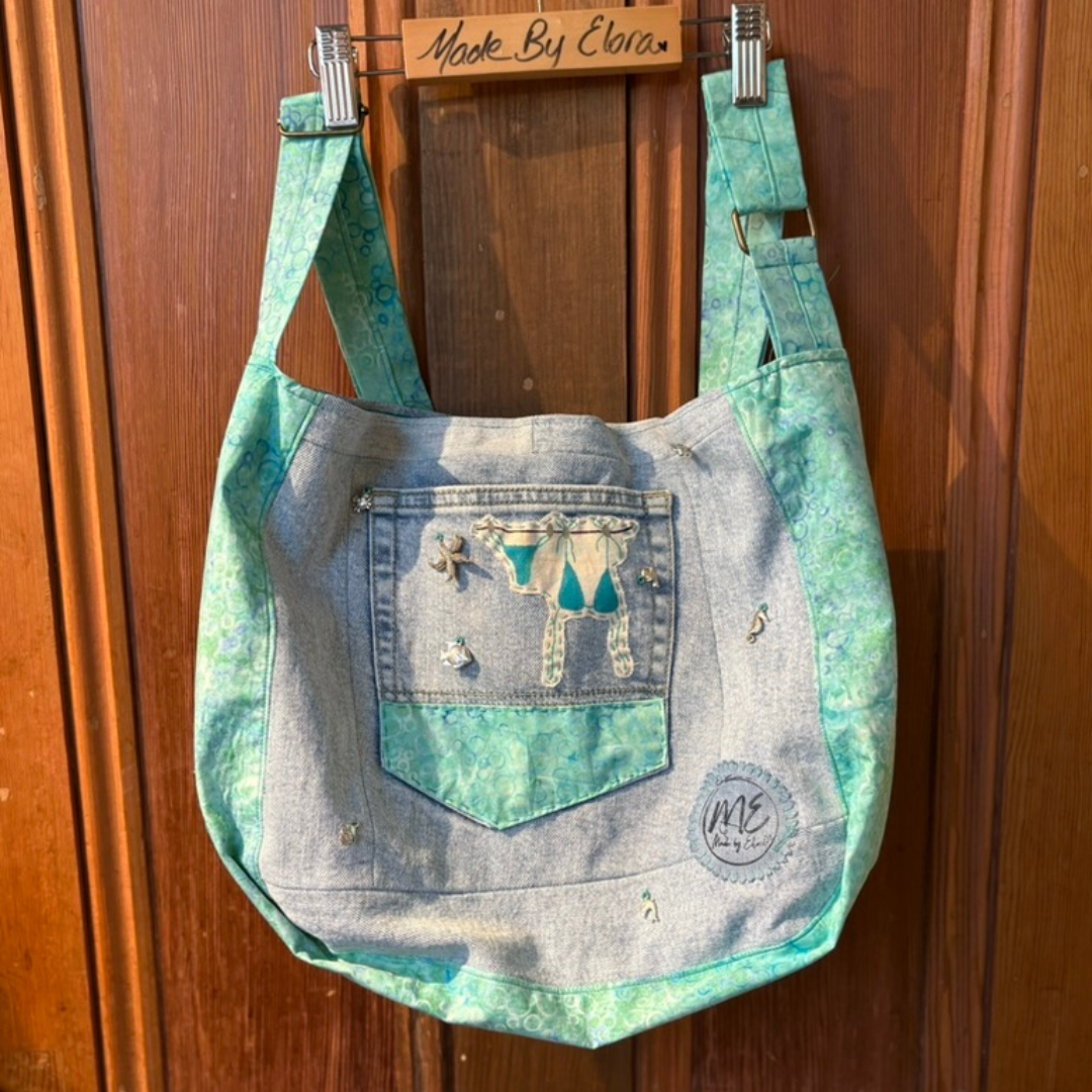 Gusted Bag with a hand Painted patch. 