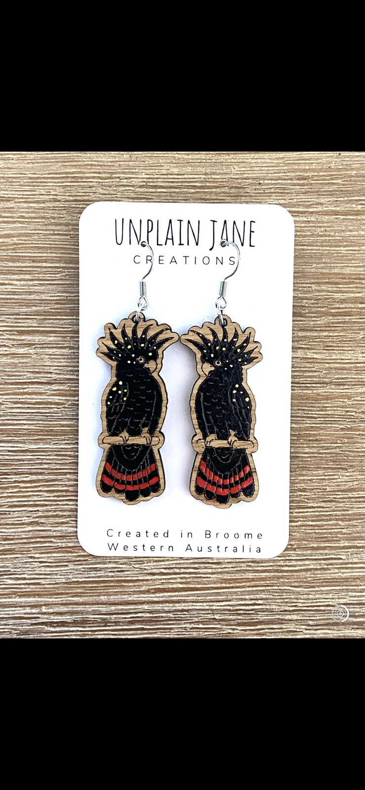 Red winged black cockatoo